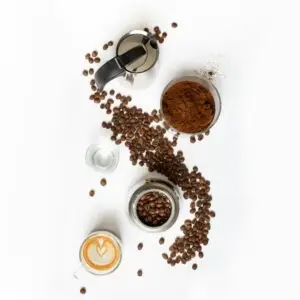 Coffee setup with coffee beans and moka pot