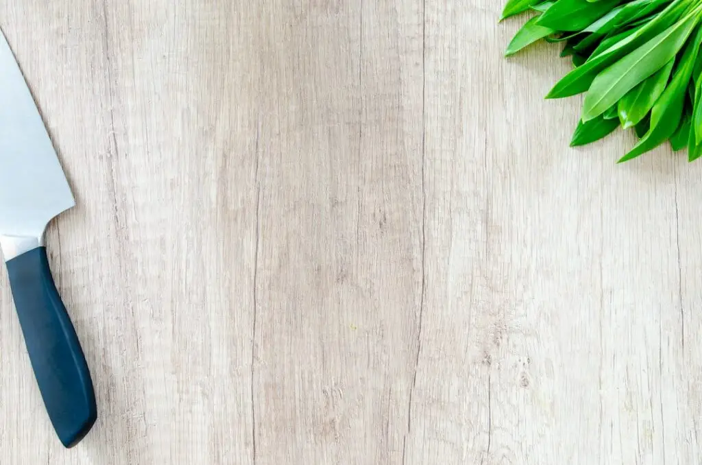 Kitchen ingredients and wooden cutting board